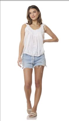 The Cheryl Embroidered Sleeveless Top Natural is a one-of-a-kind piece that will elevate any wardrobe. Made from 100% Indian cotton, this top is not only soft and comfortable, but also environmentally friendly. The natural color adds a touch of simplicity and elegance, making it perfect for any occasion. The intricate embroidery on the top adds a unique and bohemian touch, making it stand out from other tops. The sleeveless design is perfect for warmer weather and can be easily layered for coole Intricate Embroidery, Indian Cotton, Mixing Fabrics, The Natural, Top Dress, Natural Color, Dress Collection, Environmentally Friendly, Hand Embroidery