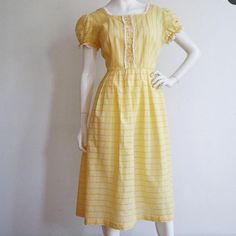 Bust: 42-44” Waist: 32-33” Hips: Free Length: 45” Excellent Condition, But Missing A Few Rhinestone Details In The Front Buttons. 1950s Style Yellow Vintage Dress For Spring, 1950s Style Vintage Yellow Dress For Spring, Yellow Vintage Dress 1950s Style For Spring, Yellow Vintage Dress, 1950s Style For Spring, Yellow Vintage Short Sleeve Dress For Spring, Yellow Short Sleeve Vintage Dress For Spring, Knee-length Yellow Vintage Summer Dress, Yellow Vintage Summer Dress For Daywear, Knee-length Yellow Vintage Dress For Summer