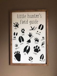 a little hunter's field guide hangs on the wall