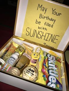 a birthday gift box filled with snacks and condiments for someone's special occasion