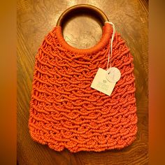 Sigrid Olsen Orange Macrame Crochet Bubble Purse With Wooden Round Handle Size: 12 X 17 X 2 Casual Orange Woven Crochet Bag, Brown Crochet Bag With Macrame Detail, Brown Macrame Crochet Bag, Orange Crochet Bag With Braided Handles For Beach, Handwoven Orange Crochet Bag For Summer, Brown Crochet Macrame Bag, Orange Crochet Beach Bag With Braided Handles, Orange Crochet Bag For Beach, Summer Handwoven Orange Crochet Bag