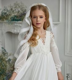 First Communion Dress, Holy Communion Dress, White tulle flower girl dress, Wedding baby dress, Festive girl dress, Birthday dress The dress is sewn according to the parameters of the customer. Included veil as in the last photo. For more information, feel free to ask questions :) Girls First Communion Dresses, Chiffon Flower Girl Dress, Girls Communion Dresses, Holy Communion Dresses, Empire Silhouette, Flower Girl Accessories, First Communion Dress, First Communion Dresses, Custom Gown