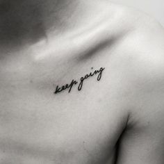 a man's chest with the word love is everything written on his left side