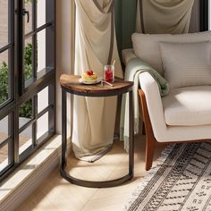 a living room scene with focus on the sofa and table in front of the window