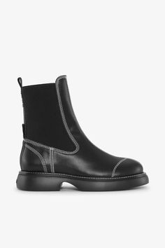 These EVA Black Everyday Mid Chelsea Boots are made from ultra-light materials and feature heavy contrast stitching, pull tabs, elastic panels and subtle GANNI logos. The outsole of this style is made from EVA, an extra light material that is usually made from petroleum based materials. 70% of the outsole has been replaced by bio-based EVA that comes from sugar cane, reducing the amount of conventional EVA made of fossil. GANNI EVA Black Everyday Mid Chelsea Boots | Women's Size 10 Chelsea Boots Women, Size 8 Women, Black Chelsea Boots, Sugar Cane, Fossil, Chelsea Boots, Chelsea, Womens Boots, Womens Sizes