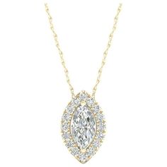 Treat her to sparkle with this shimmering diamond pendant necklace. Crafted in 10k yellow gold, the pendant features a marquise diamond center stone, bordered with a frame of smaller round accent diamonds. Radiant with diamonds and a buffed lustre, this pendant suspends along an 18-inch rope chain and secures with a spring ring clasp. Size: One Size.  Gender: female.  Age Group: adult. Pave Heart Necklace, Solitaire Pendant Necklace, Diamond Solitaire Necklace, Halo Pendant, Diamond Cross Pendants, Solitaire Pendant, Marquise Diamond, Pear Diamond, Cross Pendant Necklace