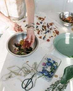 To celebrate the month of March, and the anticipation of Spring,  I wanted to share a fun beginner tutorial on floral bundle dyeing you can do in the comforts of your home! In my previous post, I gave some insight as to how to gather and collect flowers and foliage and store them for future dye projects. Let’s use some of those goods as we create a floral dyed kerchief.  For this tutorial, you will need: A piece of cotton cloth Soy milk Twine Vinegar Flower petals (I’m using marigolds, hollyhoc Flower Dyeing, Textiles Flowers, Bundle Dyeing, Eco Dyeing Fabric, Flower Dye, Dye Projects, Dyeing Tutorials, Natural Dye Fabric, Eco Dyeing