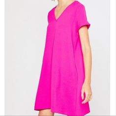 Loose V-Neck, Short Sleeve, Side Pocket, Straight Hem. Made Of Polyester Model Is Wearing A Small Small ( Bust)-35” Medium (Bust)-37” Large (Bust)-39” Casual V-neck Mini Dress For Work, V-neck Mini Dress For Work, Casual V-neck Dress With Notched Neckline For Work, Split Neck Mini Dress For Work, Spring Workwear Mini Dress With Split Neck, Pink V-neck Midi Dress, Casual Pink V-neck Midi Dress, Shift V-neck Dress With Split Neck, Casual Pink V-neck Sundress