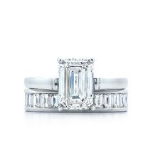 an emerald cut diamond engagement ring set with baguetts