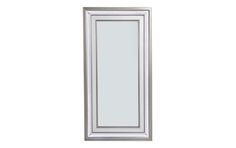 a white framed mirror sitting on top of a wall