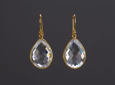 A pair of large natural quartz set in sterling silver bezel: 1. Stone : clear quartz (natural gemstone) 2. Stone size:       pear 25 x 20 mm       heart 20 x 20 mm 3. earring total length ~36 mm or 40 mm 4. bezel material: gold plated 5. earring hook: gold plated 6. if sending as a gift, a personalized jewelry note card can be included Earrings in other colors are available. Please browse my other earring listings or send you inquiry. Elegant Faceted Pear-shaped Earrings, Elegant Pear-shaped Faceted Earrings, Formal Clear Teardrop Earrings, Classic Clear Earrings For Gifts, Formal Teardrop Faceted Earrings, Elegant Teardrop Clear Earrings, Elegant Clear Teardrop Earrings, Elegant Clear Drop Jewelry, Elegant Clear Drop-shaped Jewelry