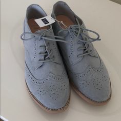 Baby Blue Laced Up Shoes Blue Round Toe Oxfords For Spring, Spring Blue Oxfords With Brogue Detailing, Blue Oxfords With Brogue Detailing For Spring, Blue Brogue Oxfords For Spring, Casual Blue Oxfords With Brogue Detailing, Casual Blue Brogue Oxfords, Casual Blue Oxfords With Round Toe, Blue Sneakers With Brogue Detailing, Gap Shoes