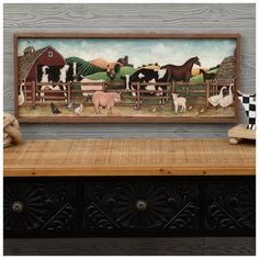 a painting of cows and sheep in a fenced in area with a stuffed animal