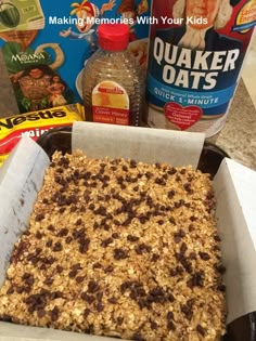 an oatmeal bars in a box next to baking supplies