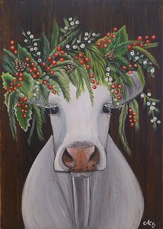 a painting of a cow with holly wreaths on it's head and nose