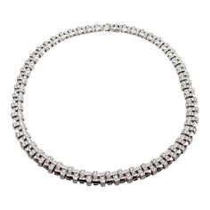 Tiffany & Co Vannerie 18k White Gold Basket Weave Diamond Necklace   This authentic Tiffany & Co. Vannerie necklace is a masterpiece of luxury and intricate design. Crafted from 18k white gold, it showcases a stunning basket weave pattern, a testament to the brand's attention to detail and craftsmanship. The necklace is adorned with an impressive 6.24 carats of dazzling diamonds, meticulously set to enhance the basket weave texture. The diamonds' brilliance is perfectly complemented by the white gold's lustrous finish, creating a harmonious and sophisticated appearance. This piece embodies the elegance and prestige associated with Tiffany & Co., making it a timeless addition to any fine jewelry collection and a symbol of opulent style.   Metal: 18k White Gold  Length: 16.75"  Weight: 88.2 Tiffany Co Necklaces, Tiffany And Co Most Expensive Necklace, Pearl Necklace Tiffany & Co., Tiffany And Co Necklace Hardwear, Luxury Jewelry Necklace Tiffany & Co., Tiffany Hardware Necklace, Tiffany And Co Necklace, Gold Basket, Tiffany And Co Jewelry