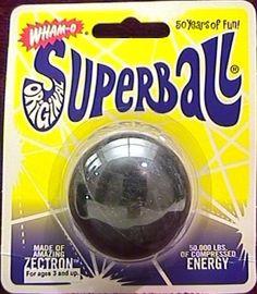 a black and white toy ball on top of a package