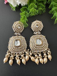 Lightweight  earrings.  Earrings length- 3.5 inches Kundan Pearl Earrings With Stone Work For Festivals, Kundan Meenakari Dangle Pearl Earrings, Kundan Dangle Pearl Earrings For Diwali, Kundan Pearl Dangle Earrings For Diwali, Bollywood Kundan Necklace With Matching Earrings For Festivals, Festive Kundan Bridal Drop Earrings, Festive Bridal Kundan Drop Earrings, Diwali Stone Work Danglers Drop Earrings, Diwali Stone Work Drop Danglers