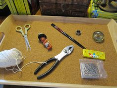 there are many crafting supplies on the table with scissors and other things to do