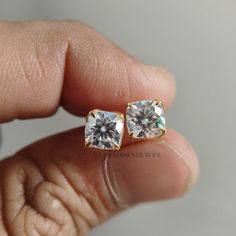 𝐒𝐭𝐨𝐧𝐞 𝐃𝐞𝐭𝐚𝐢𝐥𝐬 ➤ 𝐓𝐲𝐩𝐞: Moissanite ➤ 𝐂𝐮𝐭: Cushion ➤ 𝐂𝐨𝐥𝐨𝐮𝐫: EF ➤ 𝐂𝐥𝐚𝐫𝐢𝐭𝐲: VVS1 ➤ 𝐖𝐞𝐢𝐠𝐡𝐭: 1.00 CT (each) 𝐃𝐞𝐭𝐚𝐢𝐥𝐬 At BlueMoon Jewels, we use only the highest quality materials to craft our beautiful jewelry. Our pieces are made with solid gold in your choice of 10k, 14k, or 18k purity, or with 925 sterling silver. We offer a range of metal tones, including classic white, romantic rose, and warm yellow, to suit every taste and style. In addition to using only the finest materials, we are also committed to producing pieces that are of the highest quality and craftsmanship. To ensure the authenticity of our jewelry, every piece is stamp or hallmarked. This means that it has been officially tested and certified to meet the standards of purity and qualit Gift Moissanite Diamond Earrings Gia Certified, Gold Moissanite Earrings For Anniversary, Gold Moissanite Anniversary Earrings, Gia Certified Moissanite Diamond Earrings For Gift, Gia Certified Gold Earrings For Gift, Gift Yellow Gold Moissanite Diamond Earrings, Wedding Solitaire Diamond Earrings In Gold, Gift Quality Diamond Earrings, Gold Moissanite Diamond Earrings For Gift