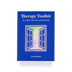 a blue book with an open door and the words therapy tool kit written on it