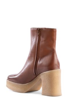 A chunky platform and block heel lend retro-inspired elements to a smooth leather bootie fashioned with a square toe for trend-savvy appeal. Leather upper and lining/synthetic sole Imported Chunky Platform, Seychelles, Leather Booties, Retro Inspired, Smooth Leather, Cognac, Bootie, Block Heels, Ankle Boot