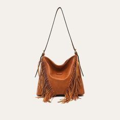 Discover Elegant Style and Functionality Embrace the perfect blend of fashion and practicality with our Luxurious Vegan Leather Tassel Shoulder Bag. Designed for the modern woman, this versatile hobo crossbody handbag is a must-have accessory for any wardrobe. Made from high-quality PU vegan leather, this bag is not only stylish but also ethically conscious. The elegant tassel decoration adds a bohemian touch, making it ideal for both casual and formal occasions. Key Features Material: High-grade PU Vegan Leather Spacious Interior: Includes a zipper pocket and a slot pocket Convenient Exterior: Features a back zipper pocket for easy access Secure Closure: Reliable zipper to keep your belongings safe Single Shoulder Strap: For comfortable carrying as a shoulder or crossbody bag Size: Genero Tassel Decoration, Bag Stand, Tassel Fringe, Leather Tassel, Elegant Style, Minimalist Fashion, Modern Woman, Cross Body Handbags, The Modern