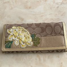 Coach Peony Appliqu Wallet Gold New, Never Used, No Tags Interior Pocket With Zipper Section Multiple Card Slots Elegant Rectangular Wallet For Spring, Elegant Rectangular Spring Wallet, Elegant Clutch Wallet For Spring, Elegant Spring Clutch Wallet, Coach Wallets As Spring Gifts, Pocket With Zipper, Bags Coach, Coach Bags, Peonies