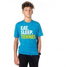 a young man wearing a blue shirt that says eat sleep baseball