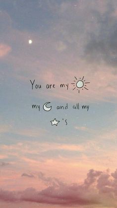 the sky is filled with clouds and stars, as if you are my sun or my moon