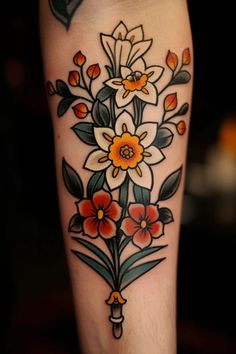 a woman's leg with flowers on it