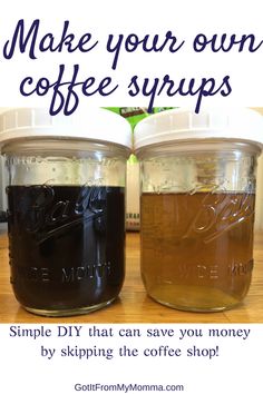 two jars filled with coffee syrup sitting on top of a table