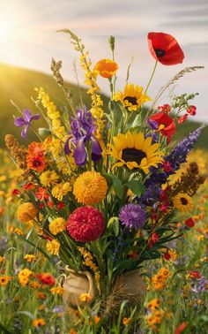 a vase filled with lots of different colored flowers in the middle of a grass field