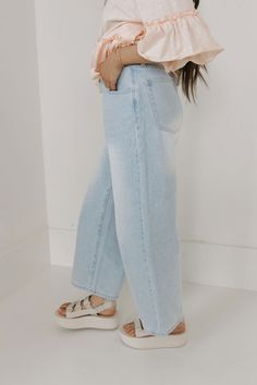 Get ready to chill out in style with our Camber Denim-Ice! These wide leg, relaxed fit jeans feature a high waist for a flattering fit. With convenient front and back pockets, you'll have plenty of room for your essentials. The light wash adds a cool and casual touch. Time to add some chill to your wardrobe! *Wide leg* Material Content: 92% Cotton // 8% Polyester Material Pattern: Light wash Czarina is 5’2” and wearing a small Model Measurements: Czarina: Height: 5’2” // Chest: 32” // Waist: 25” Light Wash Mid-rise Cargo Jeans For Summer, Relaxed Light Wash Summer Jeans, Relaxed Blue Denim Bottoms, Summer Relaxed Jeans With Pockets, Spring Wide Leg Dark Wash Cropped Jeans, Relaxed Summer Jeans For Everyday, Relaxed Medium Wash Jeans With Pockets, Versatile Medium Wash Jeans With Pockets, High Waist Washed Blue Cargo Jeans For Spring