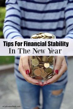 a woman holding a jar full of coins with the words tips for financial stability in the new year