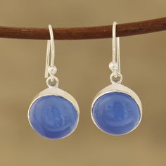 Framed by sterling silver, two round cabochons of blue chalcedony capture the beauty of the sky. Neeru Goel presents these dangle earrings, crafted by Indian artisans. Blue Chalcedony Round Jewelry, Blue Cabochon Sterling Silver Earrings, Jewellery Moulds, Earrings Round, My Cup Of Tea, Children Clothes, Earring Crafts, Fancy Jewelry, Blue Chalcedony