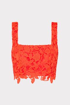 A vibrant, coral-colored lace with a summer floral motif serves as an overlay to this lined, crop top tank. For the full look, wear it with its coordinating Careen Summer Floral Lace Top.