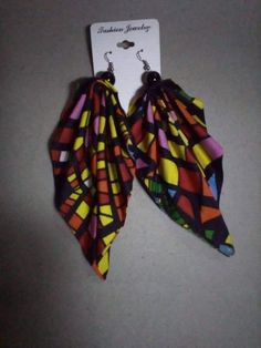 Ankara leaf earrings. Multicolor Wrap Earrings As Gift, Unique Teardrop Wrap Earrings, Multicolor Drop Wrap Earrings, Multicolor Teardrop Flower Earrings With Ear Wire, Multicolor Drop Earrings With Ear Wire, Adjustable Multicolor Wrap Earrings With Ear Wire, Multicolor Leaf Earrings For Gift, Multicolor Leaf Shaped Jewelry For Gifts, Multicolor Leaf Earrings Gift