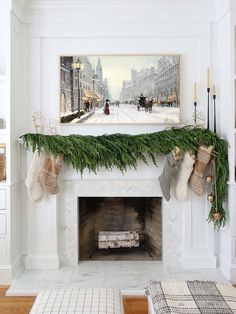 the fireplace is decorated for christmas with stockings on it