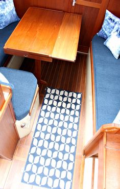 Tour the Before and After of This Updated Ticon 30 Sailboat Interior @danslelakehouse Bed Extender, Interior Makeover, Boat Interior Design, Vintage Sailboat, Fold Down Table, Vintage Stoves, Nautical Crafts