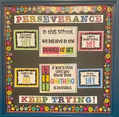 a colorful bulletin board with words and pictures on the front, saying perseverance in this school we believe in the power of get