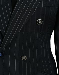 Step into the world of high-fashion with this elegant double-breasted blazer from Dolce & Gabbana. Crafted from luxurious 100% virgin wool, this sophisticated jacket features striking striped patterns and peak lapels that exude confidence and style. The blazer comes complete with a refined front button fastening, chic front pockets, and long sleeves designed to flatter your silhouette. Lined with a blend of 92% silk and 8% elastane, it perfectly marries comfort with opulence. Made in Italy, this Exude Confidence, Dolce E Gabbana, Double Breasted Coat, Double Breasted Blazer, Jacket Blazer, Black Blazer, Dolce & Gabbana, Black Button, Wool Blazer