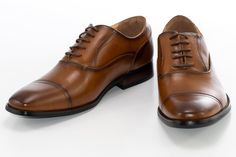 Rich color and an elegant cap-toe style accent a vintage oxford lace in this attractive dress shoe that can be worn with a formal suit or semi-casual attire. Luxurious Dress, Oxford Shoes Style, Attractive Dresses, Formal Suit, Lace Caps, Formal Casual, Business Formal, Dress Shoe, Business Casual Men