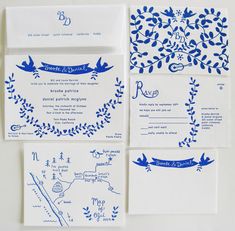 wedding stationery with blue ink on white paper and hand drawn details, including an ornament