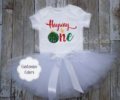 "This adorable Ornament Half Birthday Outfit will add the perfect touch to your little ones Christmas themed half birthday! Ornament Designs are made of commercial grade vinyl that is heat pressed to ensure the lifespan of your shirt. This listing also includes the option of adding a tutu & your little loves name to the \"Half BIRTHDAY Shirt\" if selected from the options menu. ~ CURRENT Processing time is 3-5 BUSINESS DAYS ~ ~ If you need your order by CERTAIN DATE please CONTACT ME ~ ★★ ORDERING INSTRUCTIONS ★★ ::DESIGN COLORS: Please use the \"VINYL\" color charts to select the color(s) you would like the design to be. If no colors are noted on your order then you will be sent what is in the first picture of this listing. ::TUTU COLORS: Choose up to 3 colors from the \"TULLE\" color cha Half Way To One Christmas Theme, Half Birthday Theme, One Christmas Birthday, Christmas Birthday Shirt, Birthday Outfit Winter, Halfway To One, Half Birthday Shirt, Outfit Weihnachten, Half Birthday Outfit