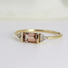 Morganite Ring With Diamond Accents, Exquisite Baguette Cut Promise Ring, Morganite Ring With Diamond Accents For Promise, Gold Morganite Rings For Anniversary, Exquisite Gold Morganite Ring, Baguette Cut Rings With Accent Stones For Promise, Morganite Ring In Yellow Gold, Exquisite Morganite Rings For Anniversary, Morganite Ring With Bezel Setting For Anniversary