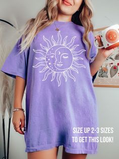 "♥ Hello and Welcome to Meaningful Tees Shop! ♥ Express your Mystical Soul with this Giant Sun and Moon Comfort Colors Brand Tee!  The Design measures 12\" across! I have a smaller one in my shop as well : ) ♥ Model is wearing Washed Denim and sized up 3 sizes for a dramatic oversized lool! Tshirt Mockups are Butter and Berry. ♥ Comfort Colors Tees are Garment Dyed Heavyweight Cotton that are pre-washed MANY times to give them a rich color and a VINTAGE LOOK and FEEL. ♥ All of our items are made one at a time with care for each customer : ) ♥ Please allow 3-7 BUSINESS days (most often 3-5) for your item to be created PLUS shipping time via USPS ♥ Comfort Colors Tees are Unisex and fit like a Mens Shirt, but are not overly large. ♥ For a RELAXED FIT, your usual size will typically work, but Sun And Moon Shirt, Be A Good Human, Moon Tshirt, Celestial Shirt, Good Human, Boho Sun, Comfort Colors Tshirt, Moon Shirt, Be A Nice Human