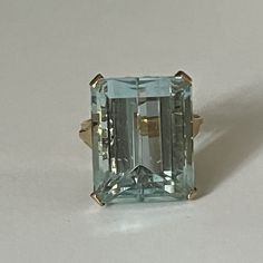 Yellow gold (18k) ring adorned with a large aquamarine in a claw setting. Weight of aquamarine: approximately 22 ct (approximately 19 x 15 x 11 mm) Gross Weight: 10.50 g. Size: 53 Possibility of sizing, contact us. Further information : We issue an invoice as well as a certificate of authenticity established by our qualified gemologist (LFG Paris). Our photos are not reworked and are taken in a natural light environment. We can send you a short video upon simple request. Each piece of jewelry is Formal Light Blue Topaz Ring, Formal Rectangular Aquamarine Rings, Formal Light Blue Topaz Ring Fine Jewelry, Light Blue Topaz Ring For Formal Occasions, Classic Aquamarine Rings For Formal Occasions, Classic Light Blue Topaz Ring For Formal Occasions, Modern Light Blue Jewelry For Formal Occasions, Claw Setting, Etsy Gold Ring