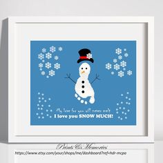 a snowman with a hat and scarf on it's head is in front of a blue background