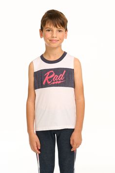 Bad to the bone? More like rad to the bone! Show the world just how rad your little rascal is in our Boy's Rad Recycled Vintage Jersey Blocked Muscle Tank in white. With cool color blocked details and a retro graphic, this tank is sure to make a statement. But what's even cooler? It's made from our super soft, recycled vintage jersey fabric that's kind to the planet. Style it with joggers and trendy kicks for the ultimate cool kid look. White is an always-classic color that you'll reach for time To The Bone, Bad To The Bone, Vintage Jerseys, The Bone, Boys Top, Muscle Tank, Muscle Tanks, Jersey Fabric, Cool Kids